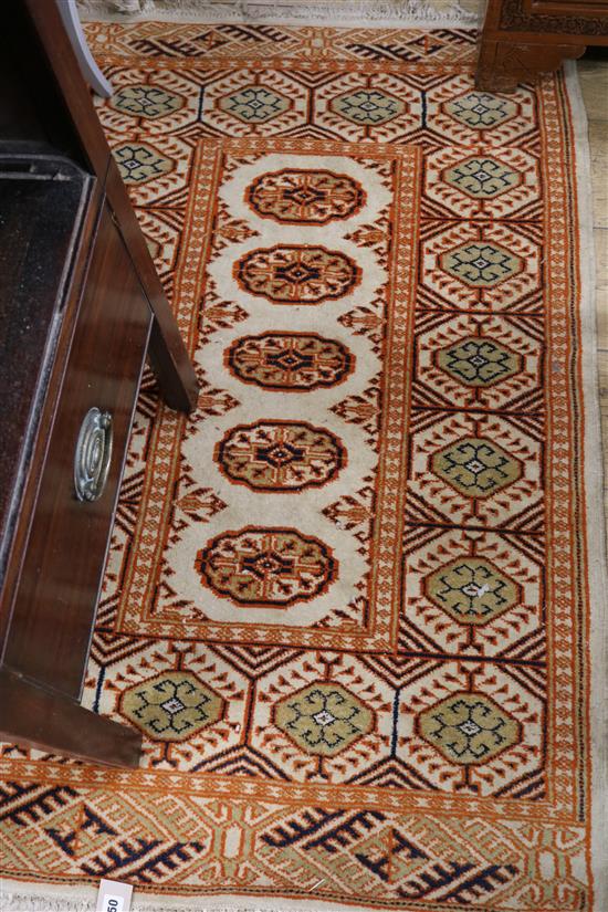 A ground orange prayer mat 125cm x 80cm